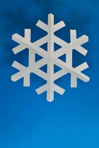 Exquisite paper snowflake crafted with precision, a charming winter decoration for family fun. Embrace creativity with Our Days Calendar. #OurDaysSnowflakeCraft